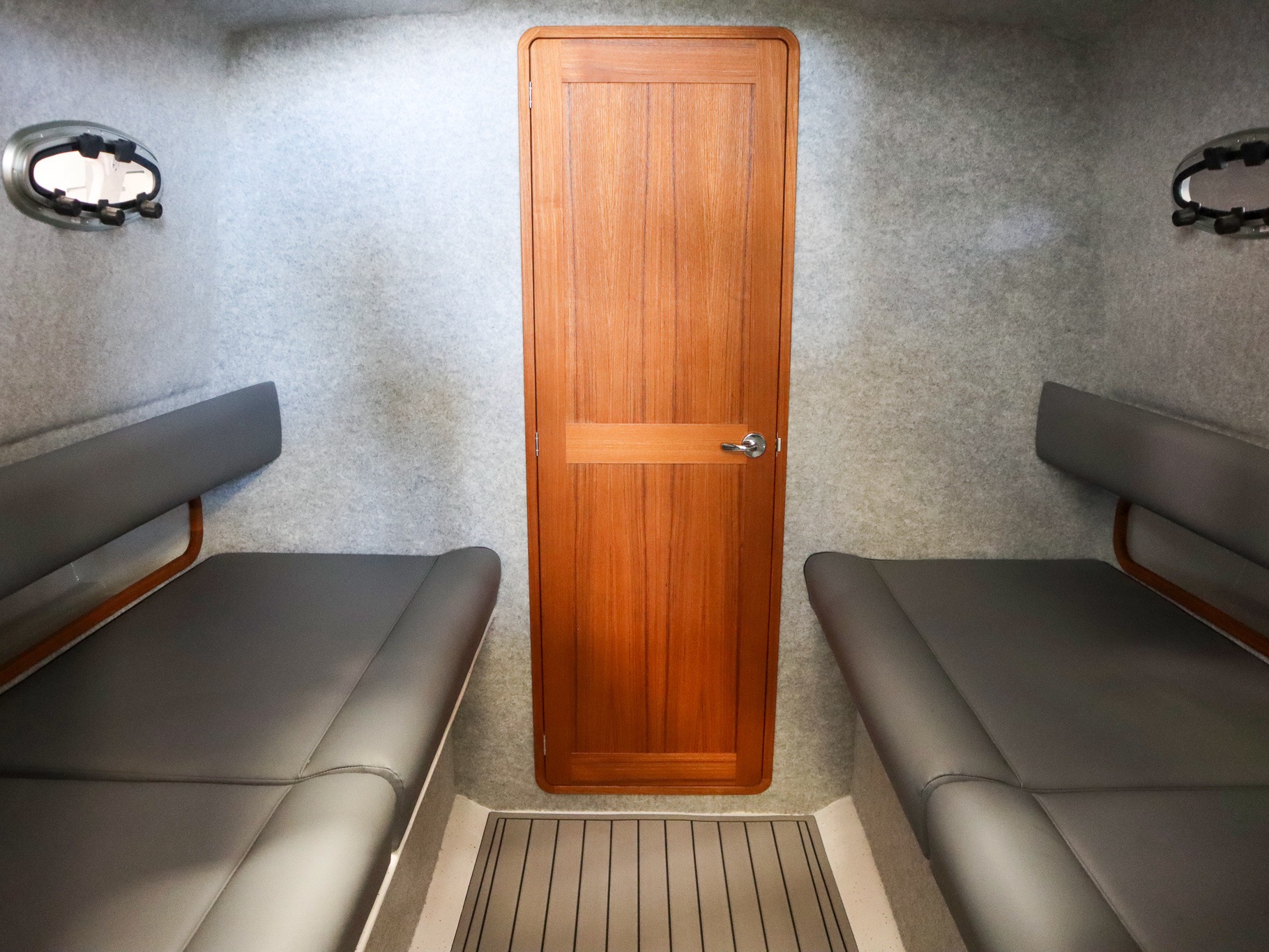 Bunks and door to separate changing and heads cabin